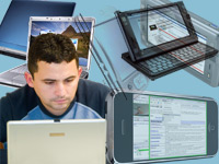 MSACS graduate surrounded by technological devices provided in the program